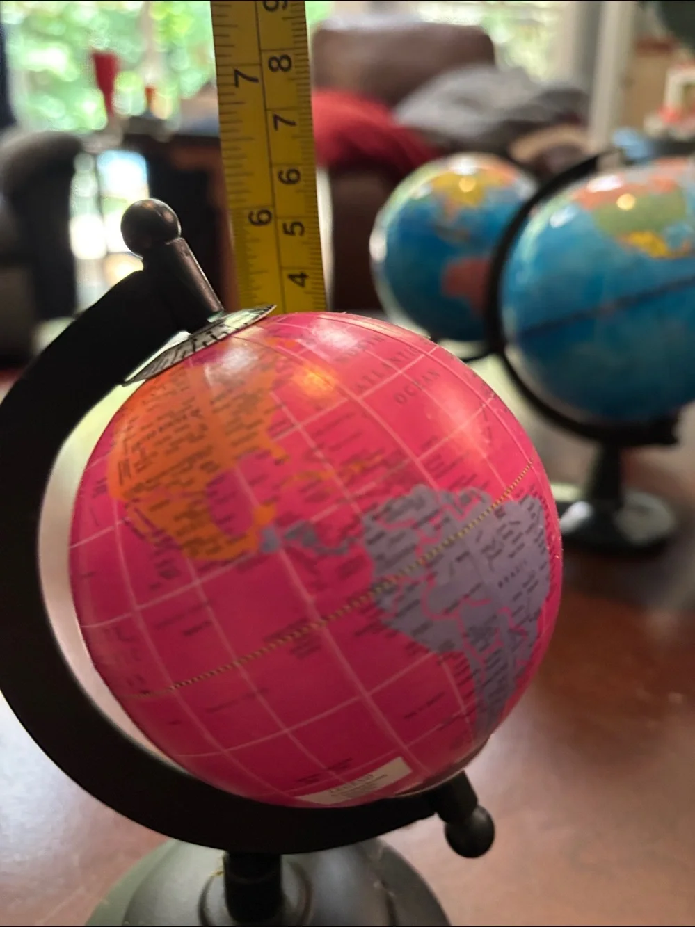 7 Mini Decorative Globes 6 Blue & 1 Pink